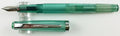 Noodler's Nib Creaper flex fountain pen in Truk Lagoon, uncapped with cap alongside